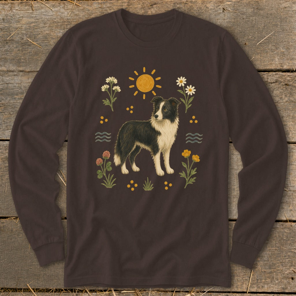 Brown long-sleeve shirt with a Border Collie illustration surrounded by flowers, sun, and water waves.