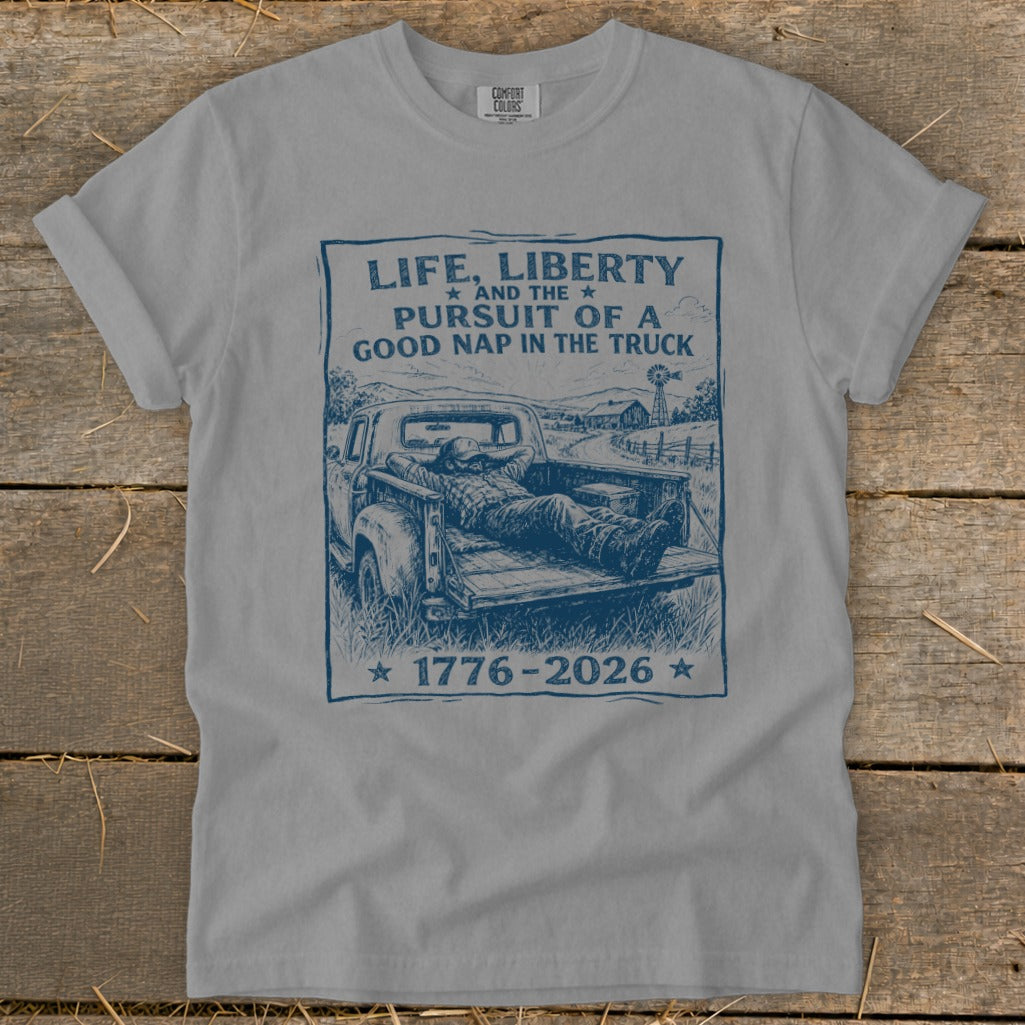 T-shirt with "Life, Liberty, Pursuit of a Good Nap in the Truck" graphic.