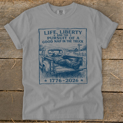 T-shirt with "Life, Liberty, Pursuit of a Good Nap in the Truck" graphic.