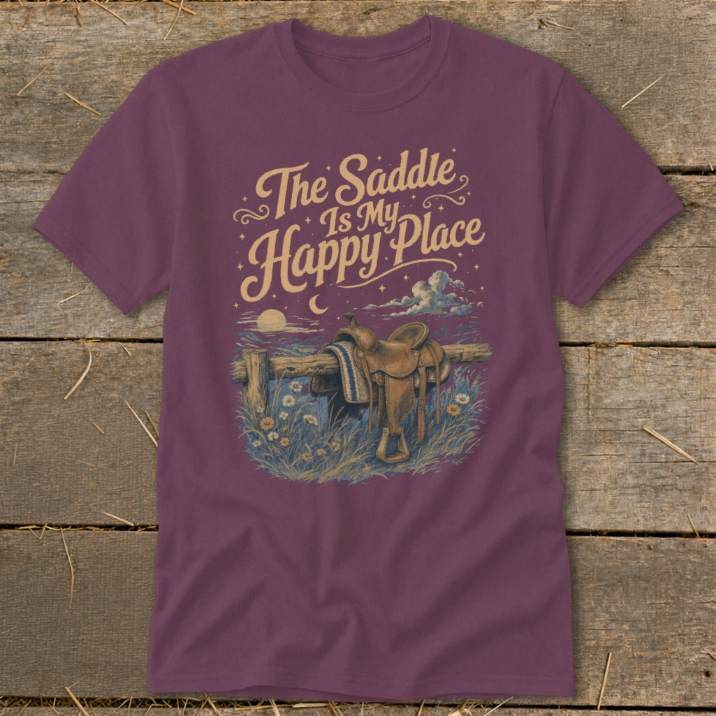 Maroon t-shirt with "The Saddle Is My Happy Place" text and saddle on fence.
