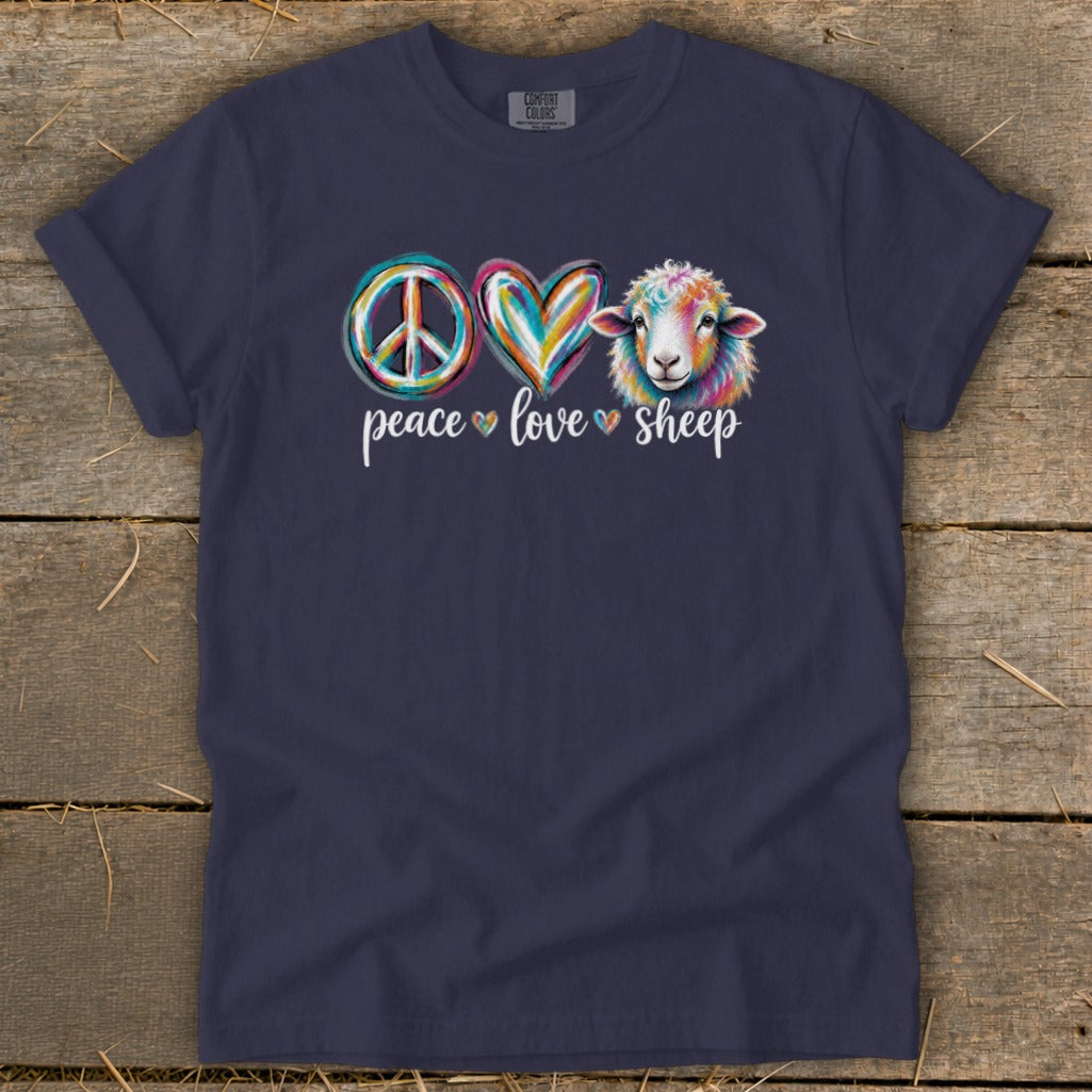 Dark navy t-shirt with "Peace Love Sheep" graphic featuring a peace sign, heart, and colorful sheep.