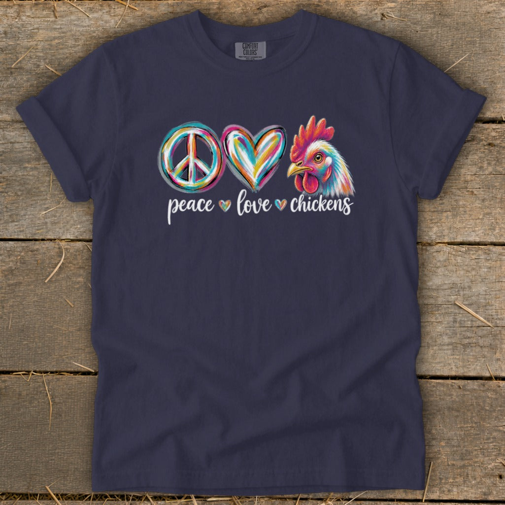 Navy t-shirt with peace, heart, and colorful chicken graphic and "peace love chickens" text.