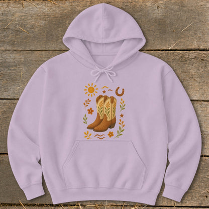 Lavender hoodie with cowboy boots, sun, and horseshoe graphic design.