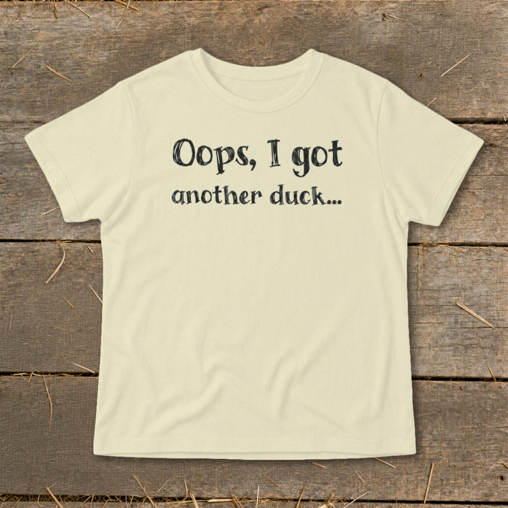 Cream t-shirt with "Oops, I got another duck..." text.