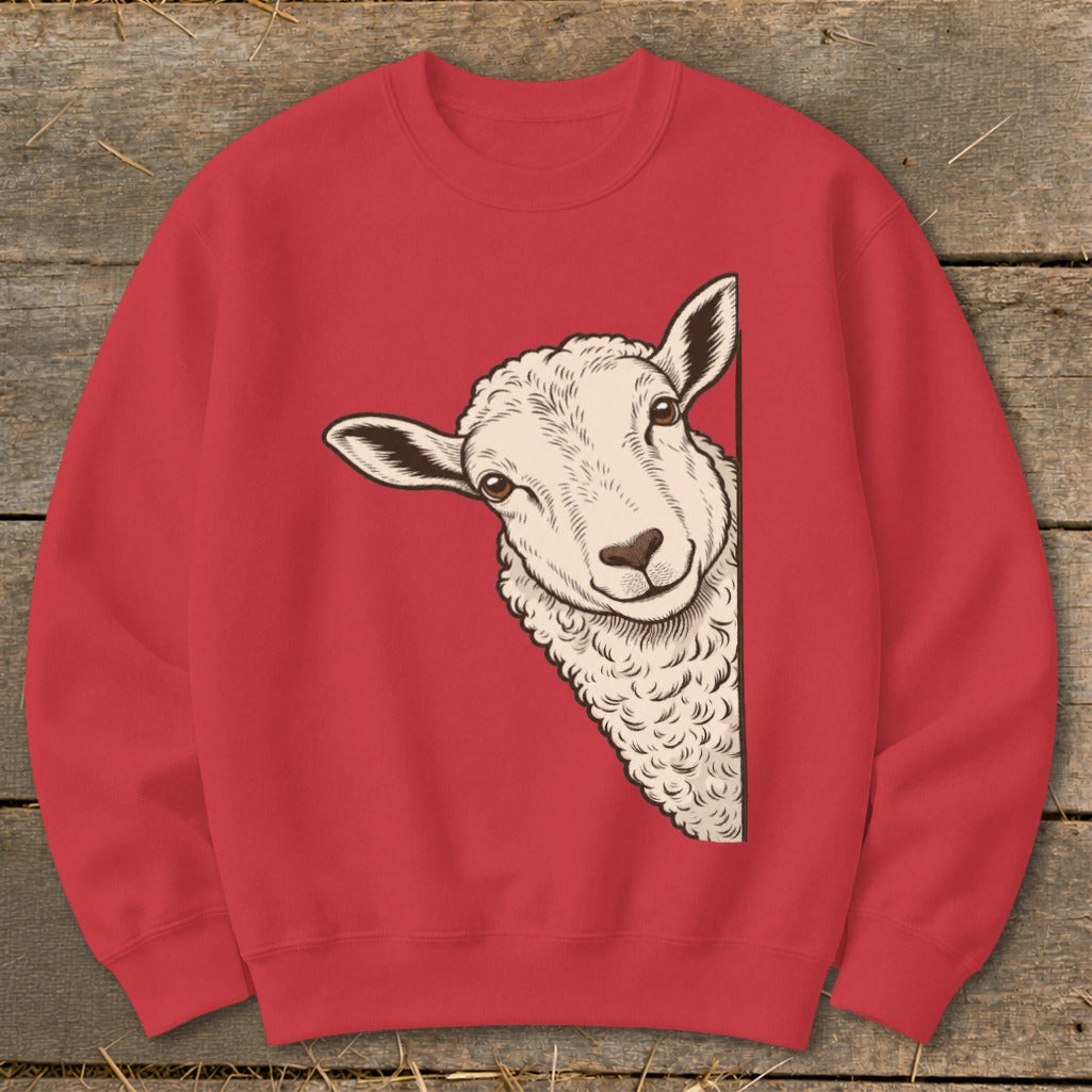 Red sweatshirt with a drawing of a sheep peeking from the side.
