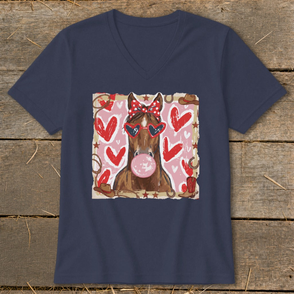 Brown horse wearing heart sunglasses and red bow, blowing bubblegum, on pink and red heart background.