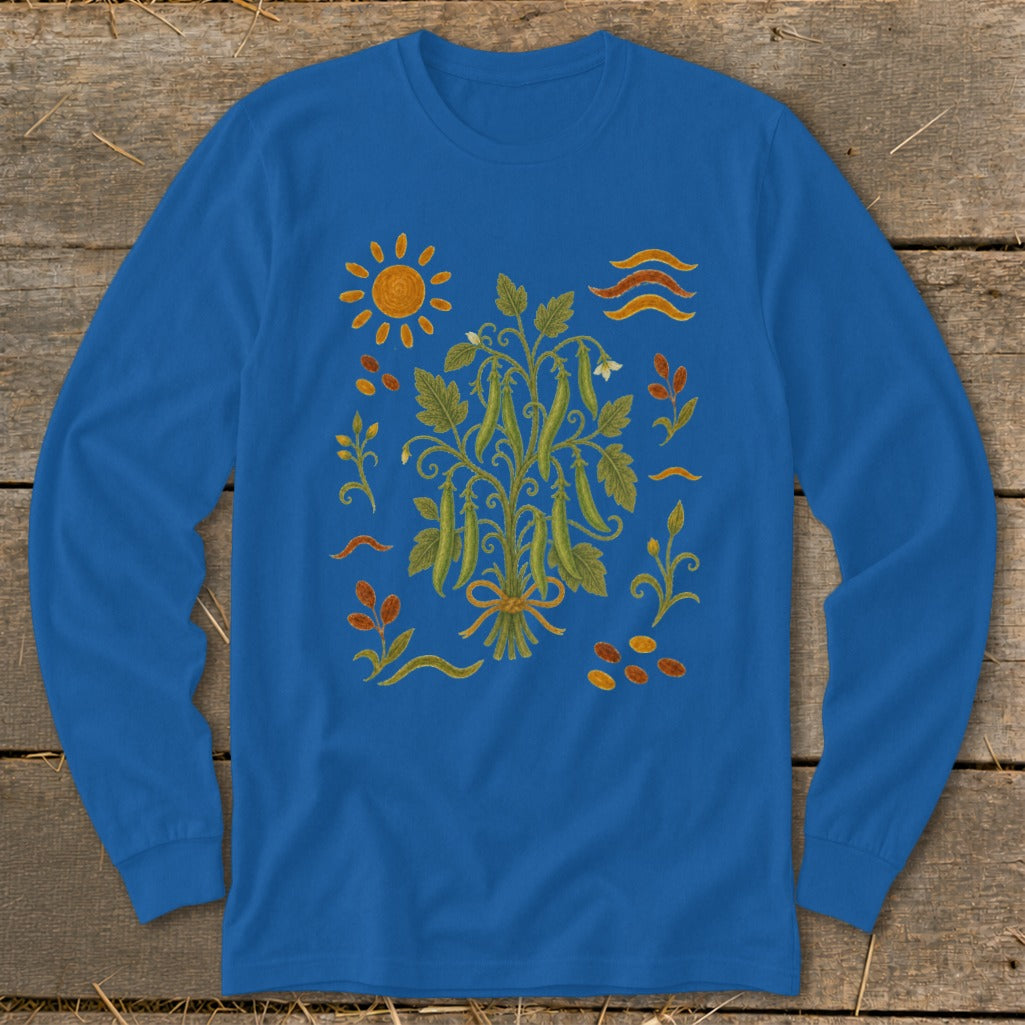 Blue long-sleeve shirt with a stylized garden illustration featuring pea pods, sun, and leaves.