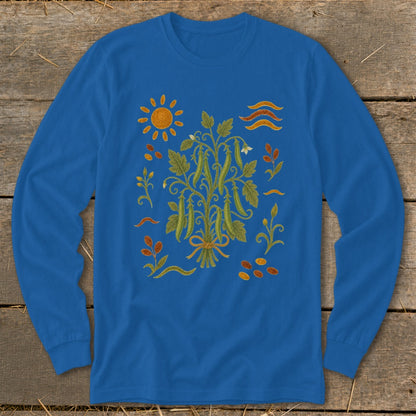 Blue long-sleeve shirt with a stylized garden illustration featuring pea pods, sun, and leaves.