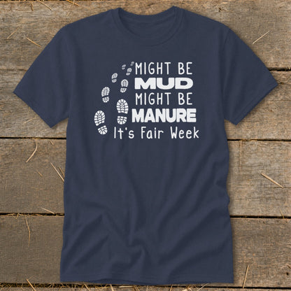 Navy t-shirt with white text and footprint graphics: "Might be Mud, Might be Manure, It's Fair Week."
