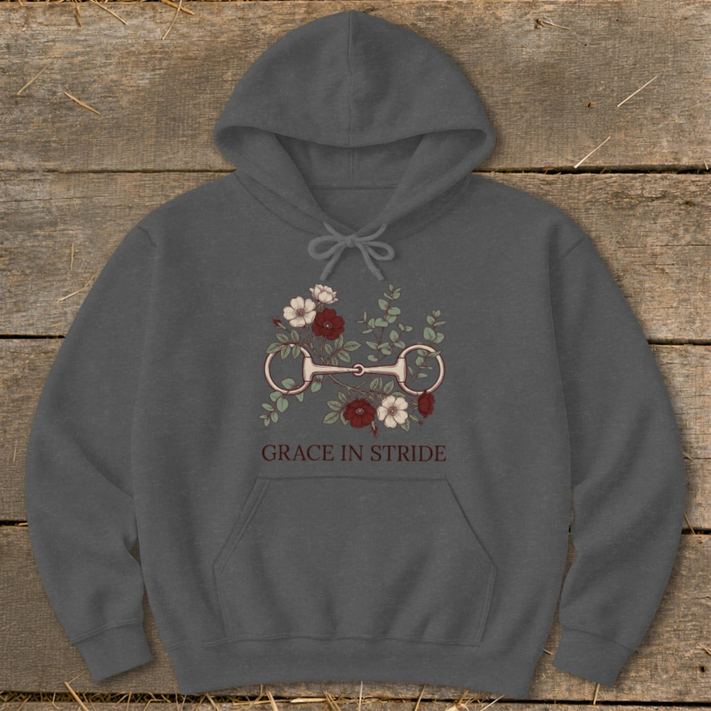 Dark grey hoodie with horse bit and floral design, text "GRACE IN STRIDE".