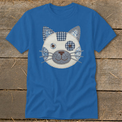 Blue t-shirt with a stitched cat face applique in blue and white fabrics.