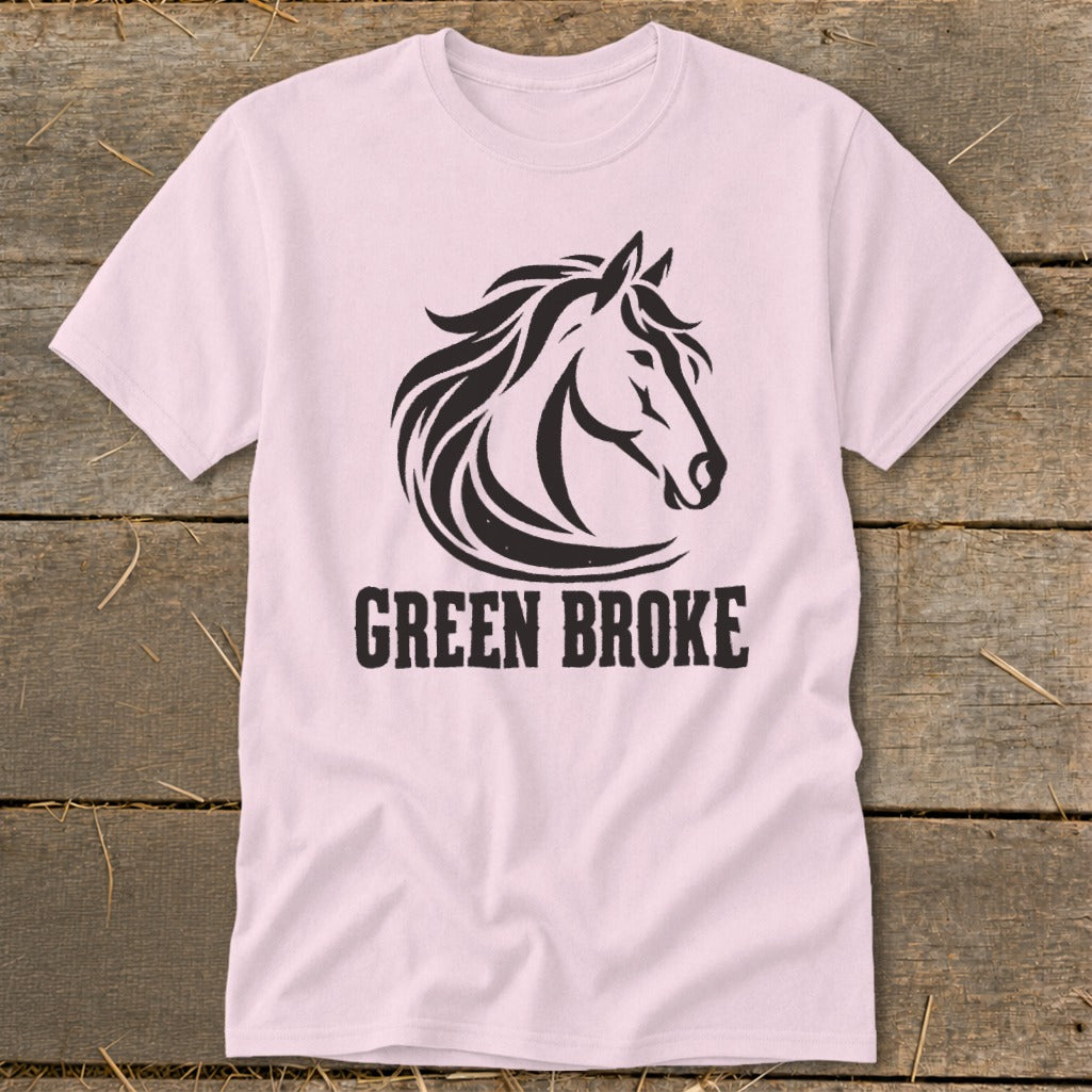 Light pink short-sleeve t-shirt featuring a black graphic of a horse head and the words Green Broke.