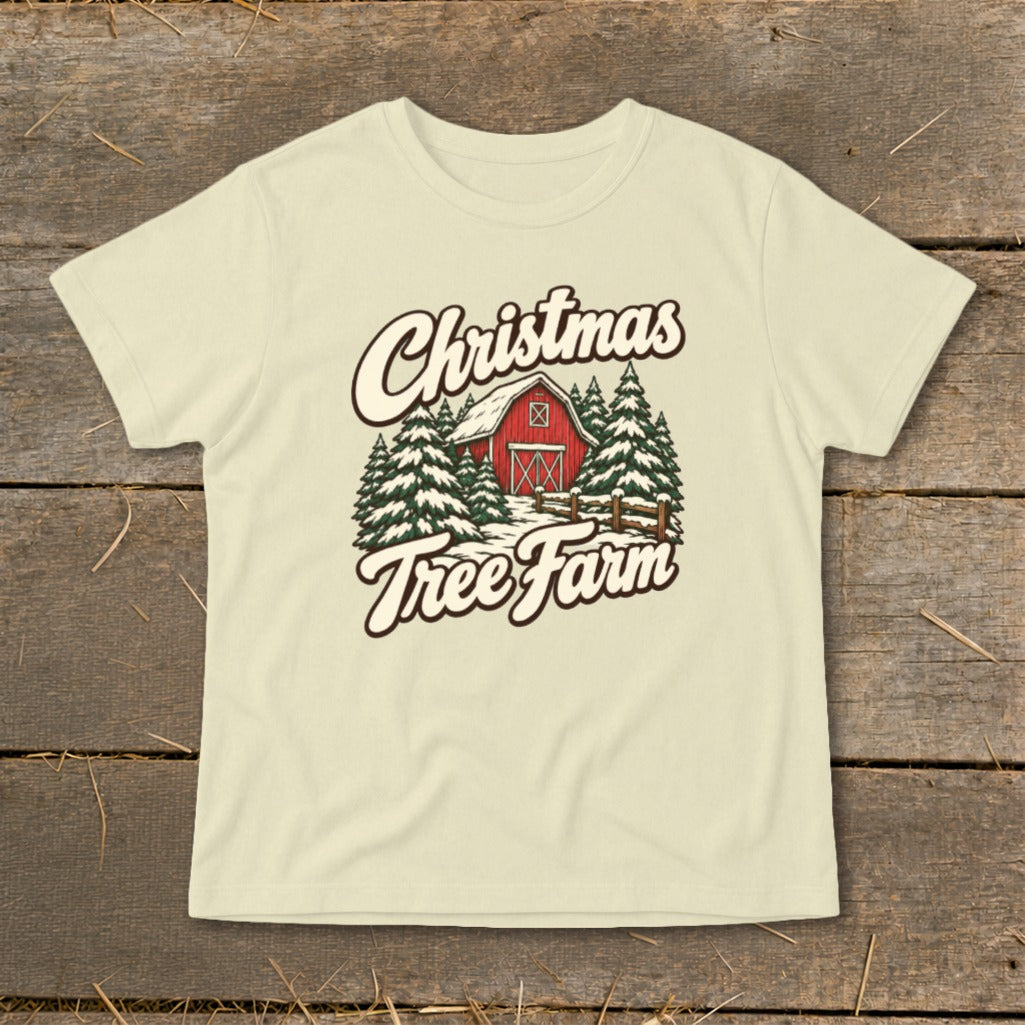 Cream t-shirt with "Christmas Tree Farm" text and a winter barn scene.