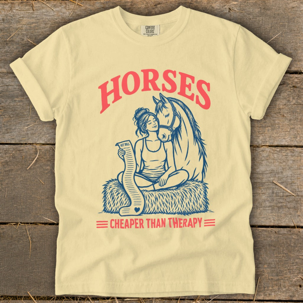 T-shirt graphic: woman with horse, holding a "vet bill," text "HORSES CHEAPER THAN THERAPY".
