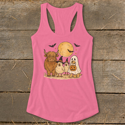 Halloween Highland cow, chickens, and dog in a sheet with pumpkin, under the moon.