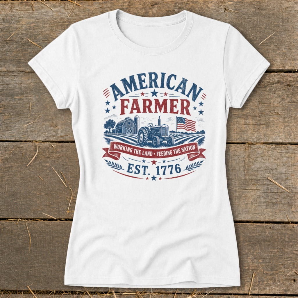 White t-shirt with "American Farmer" graphic, tractor, barn, and flag.