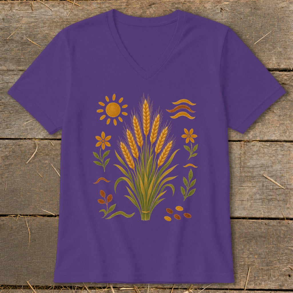 Purple v-neck t-shirt with a graphic of wheat, sun, flowers, and wavy lines.