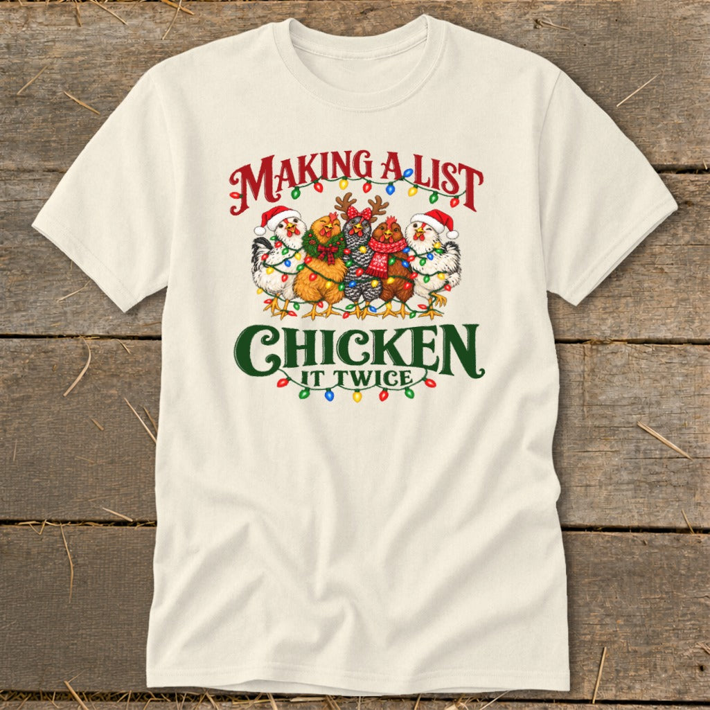 Cream t-shirt with chickens in Santa hats and Christmas lights, reads "Making a list, chicken it twice".