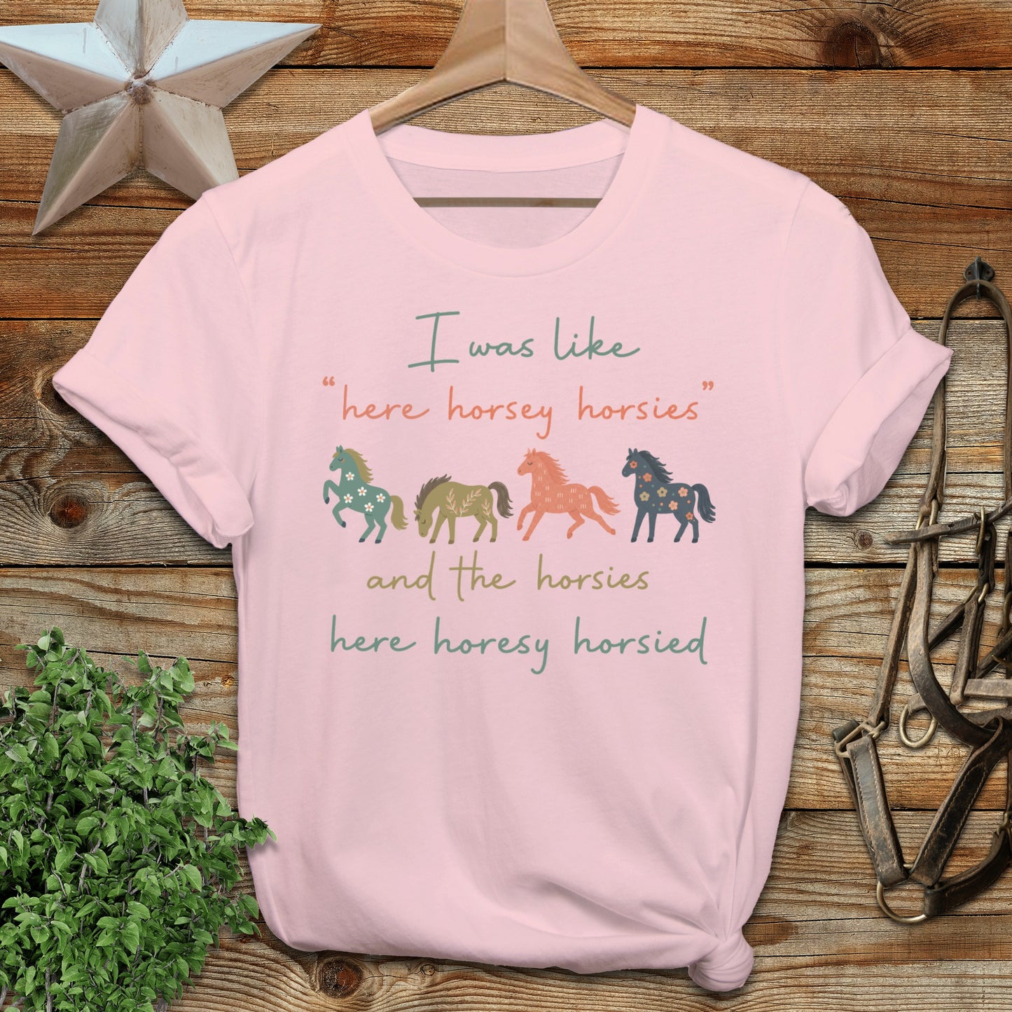 Pink t-shirt with "here horsey horsies" and "here horesy horsied" text.