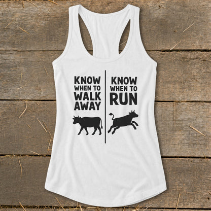 White tank top with text "Know when to walk away" and "Know when to run" with cows.