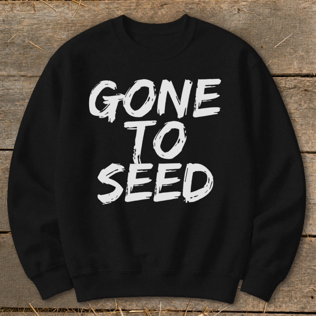 Black sweatshirt with white text "GONE TO SEED"