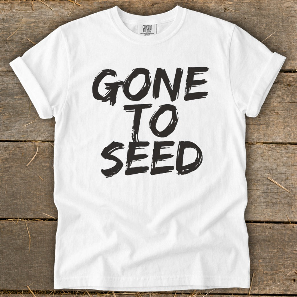 White t-shirt with black text reading "GONE TO SEED".