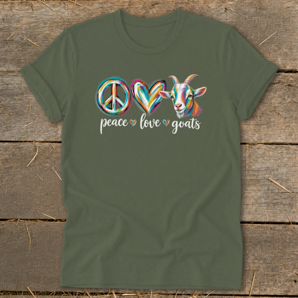 Green t-shirt with peace sign, heart, and colorful goat graphic.