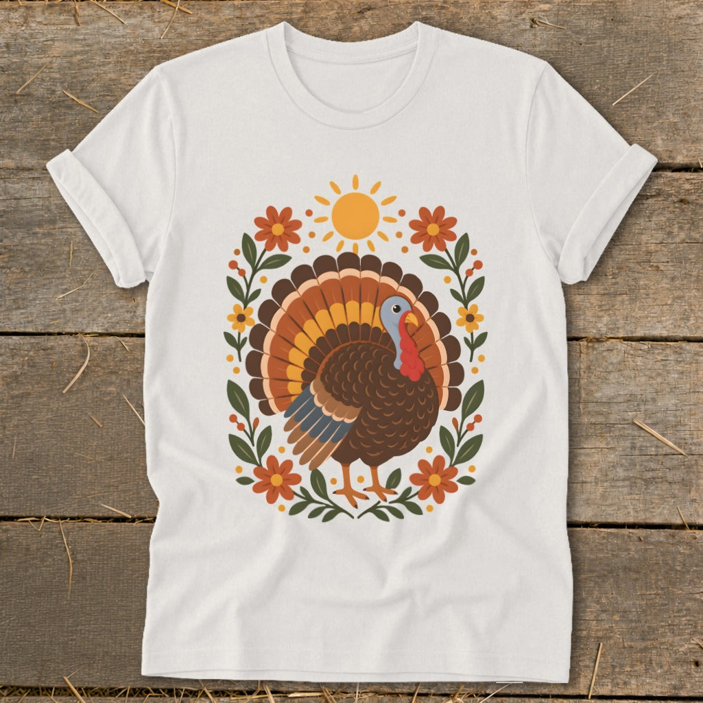 White t-shirt with a Thanksgiving turkey and floral design.