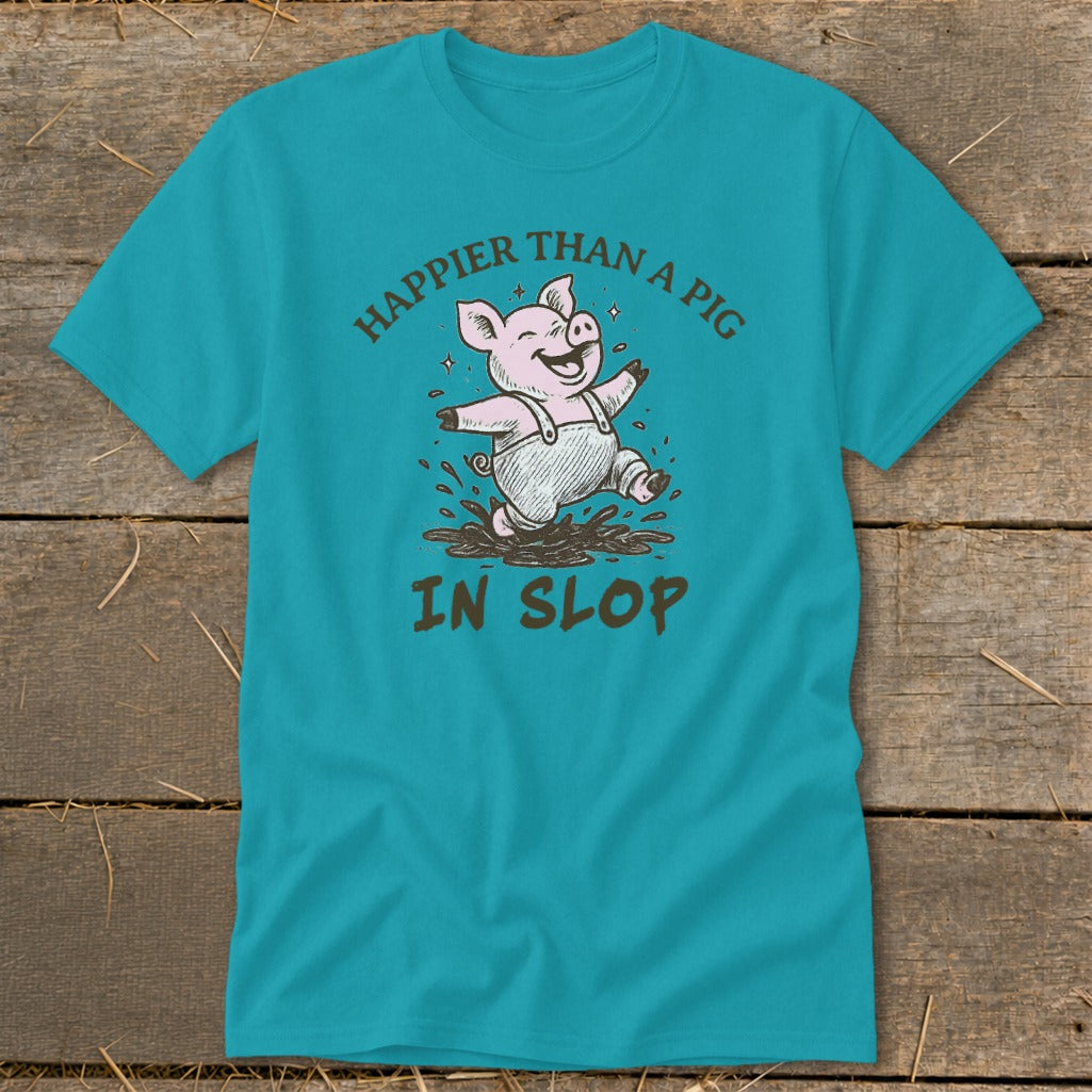Turquoise t-shirt with cartoon pig jumping in mud, saying "Happier Than A Pig In Slop."