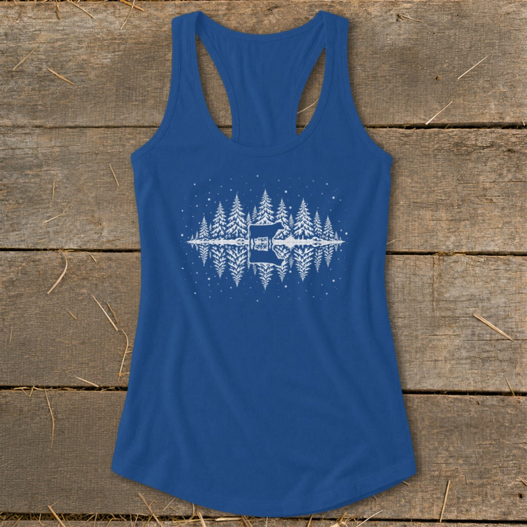 Royal blue tank top with white mirrored forest and cabin graphic.