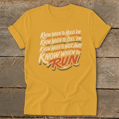 Yellow t-shirt with text: Know When To Hold 'Em, Know When To Cull 'Em, Know When To Walk Away, Know When To RUN!