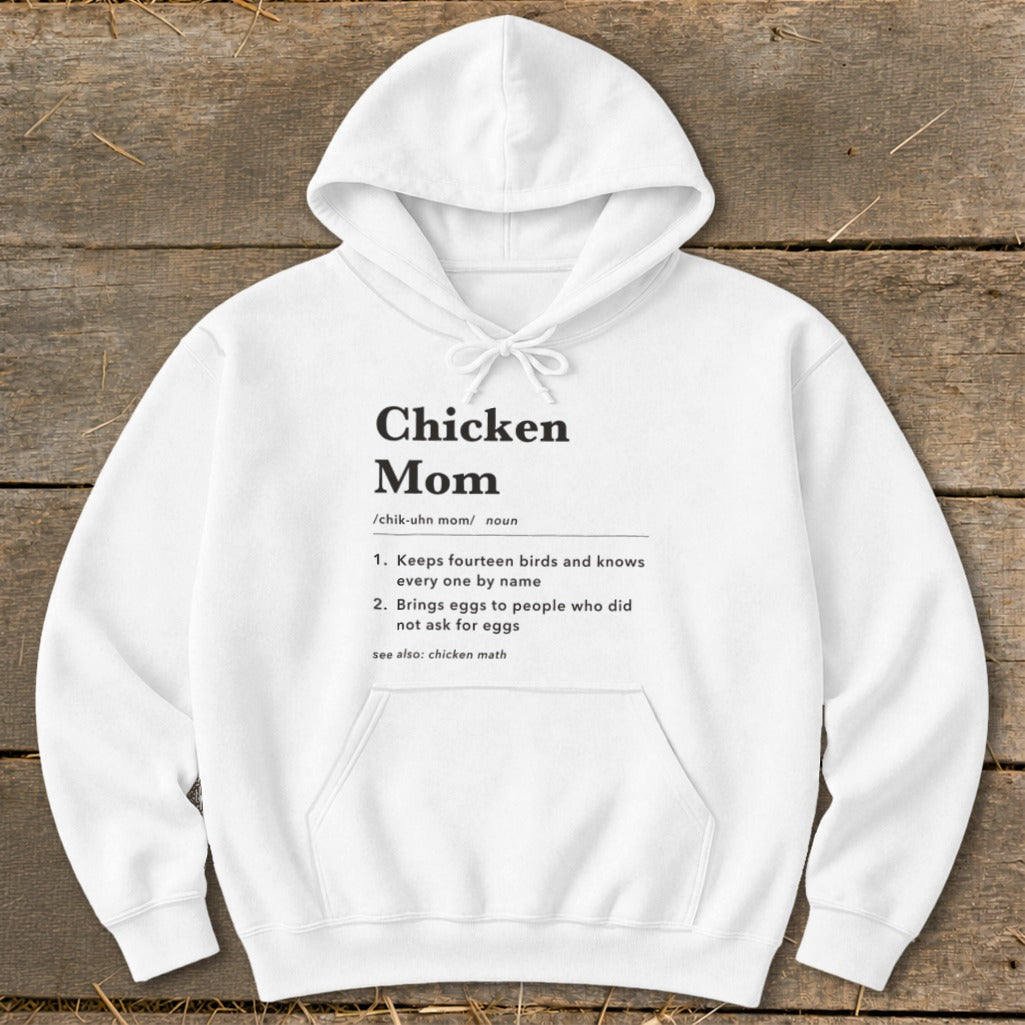 White hoodie with black text defining "Chicken Mom" and its characteristics.