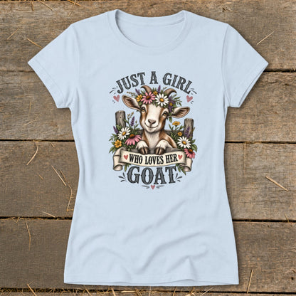 Light blue t-shirt with a goat wearing a flower crown, text reads "Just a girl who loves her goat".
