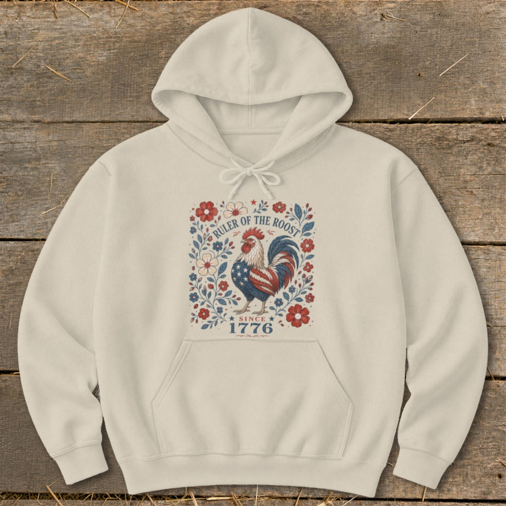 Cream hoodie with patriotic rooster graphic and "Ruler of the Roost Since 1776".