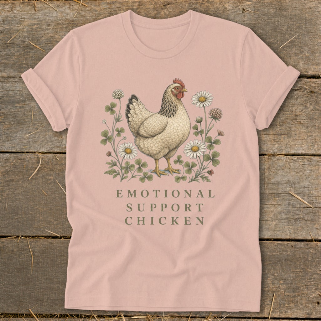 Pink t-shirt with a chicken illustration and "Emotional Support Chicken" text.