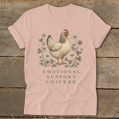 Pink t-shirt with a chicken illustration and "Emotional Support Chicken" text.
