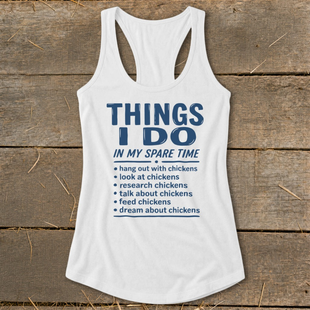 White tank top with blue text "Things I Do In My Spare Time" and chicken-related activities.