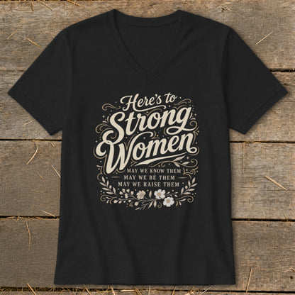 Black t-shirt with "Here's to Strong Women" and related text.