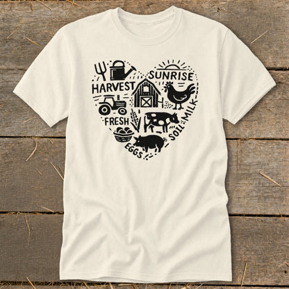 Cream t-shirt with a heart-shaped farm graphic including barn, tractor, animals, and text.