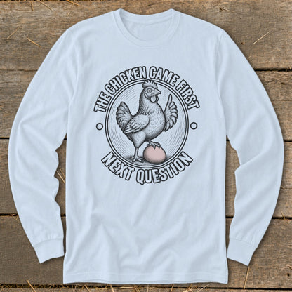 Chicken with egg and text "The chicken came first. Next question."