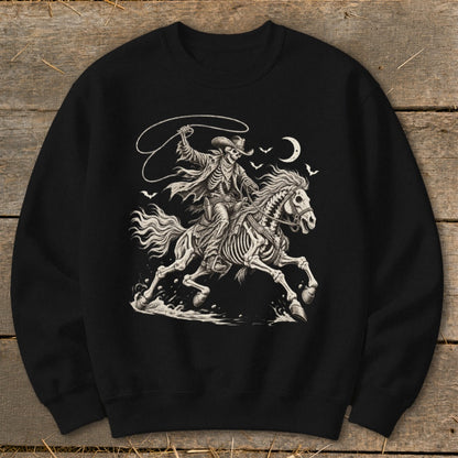 Skeleton cowboy on horseback with lasso under moonlit sky and bats.
