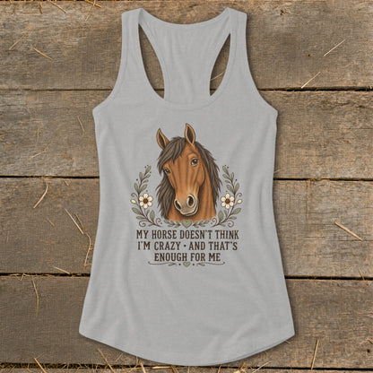 Light gray tank top with horse graphic and text "My horse doesn't think I'm crazy."