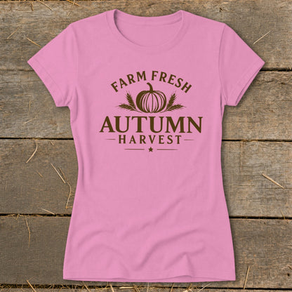 Pink t-shirt with brown "Farm Fresh Autumn Harvest" graphic and pumpkin.