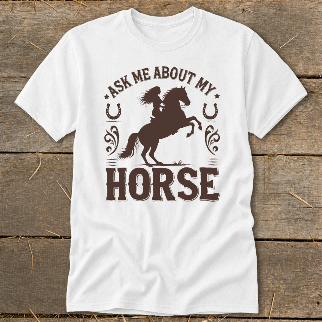 White t-shirt with dark brown text and graphic of a rider on a bucking horse.