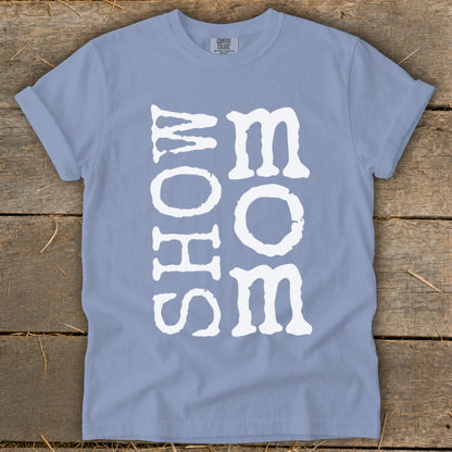 Light blue t-shirt with white "SHOW MOM" text vertically printed.