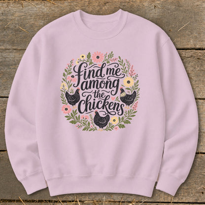 Light purple sweatshirt with "Find me among the chickens" text and floral chicken design.