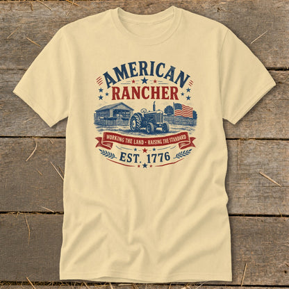 Cream t-shirt with "American Rancher Est. 1776" design featuring a tractor, barn, and flag.