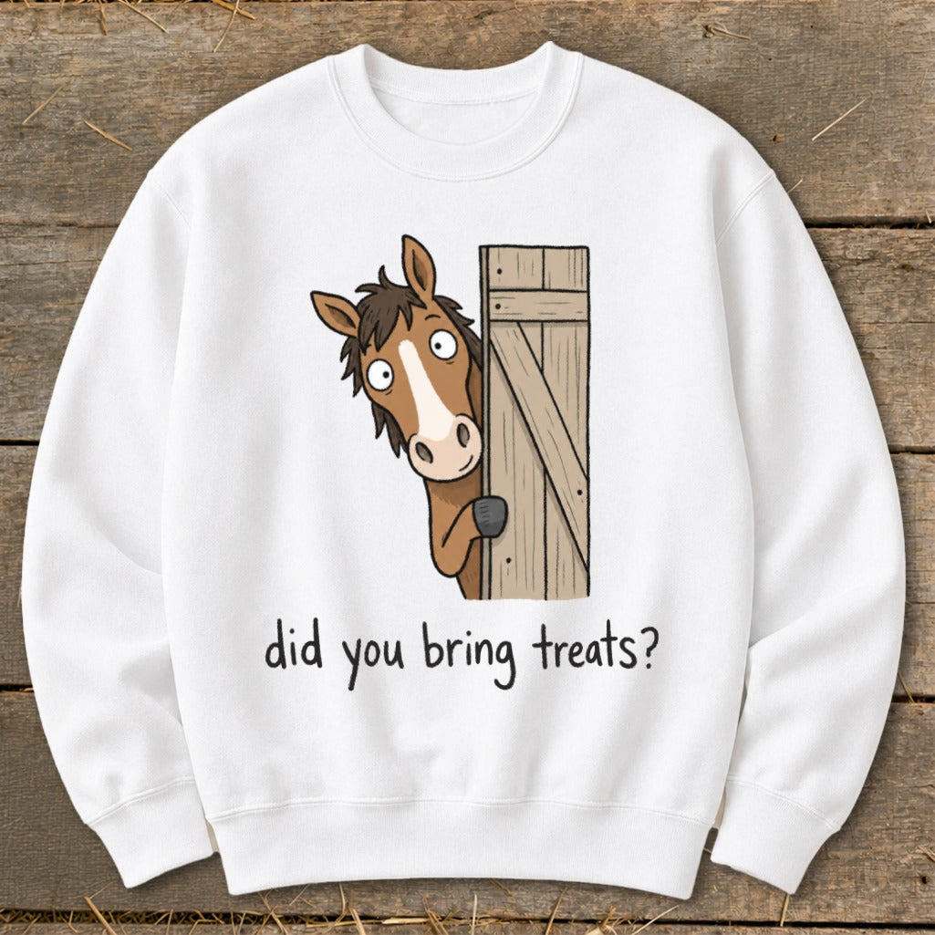 White sweatshirt with cartoon horse peeking from behind a wooden gate, text "did you bring treats?".