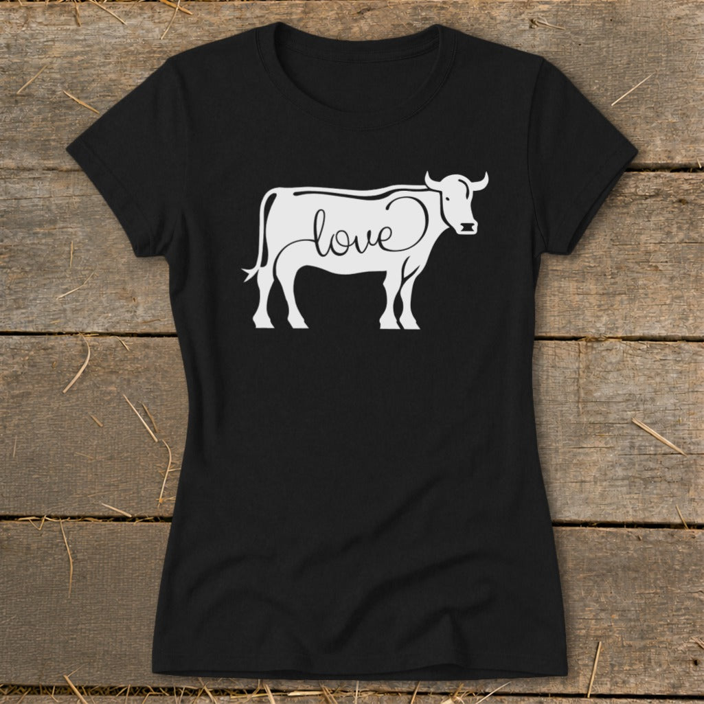 Black t-shirt with white cow outline design incorporating the word "love."