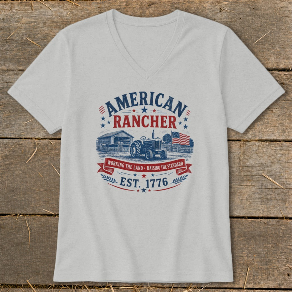 American Rancher graphic with tractor, barn, flag, and EST. 1776 text.